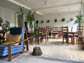 Sand floor dining area at Island Break